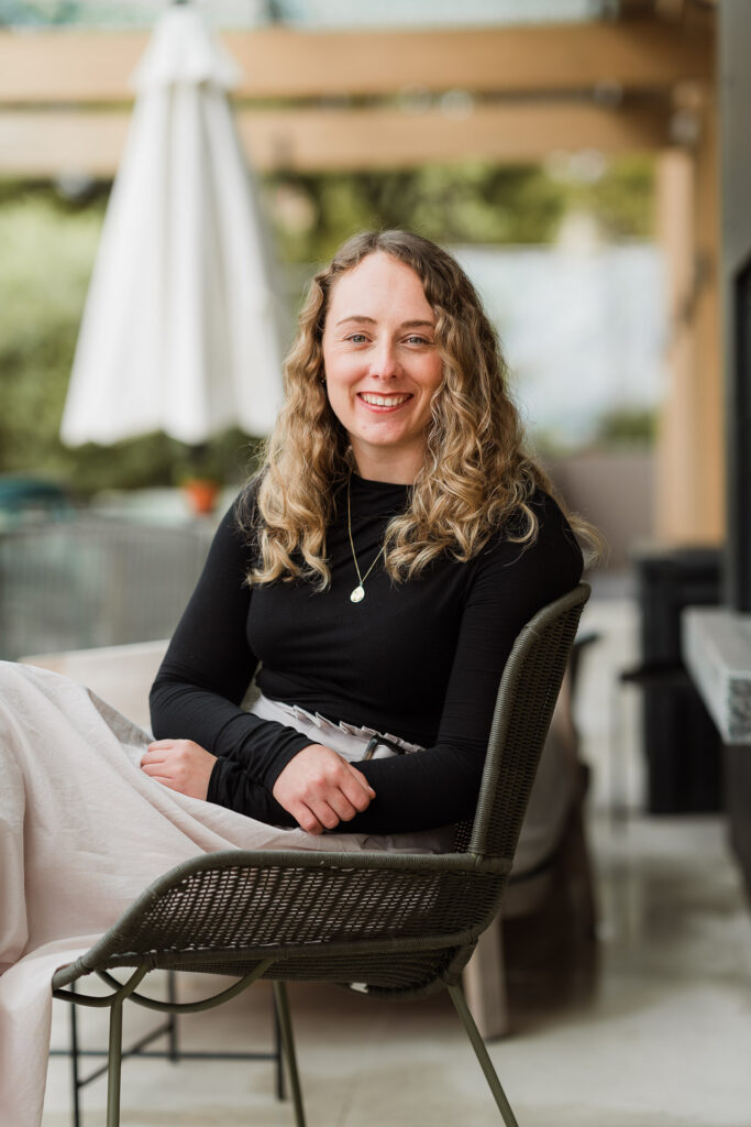 Sharp individual brand photo of a Martin & Parker Law associate with cafe background in Silverdale.