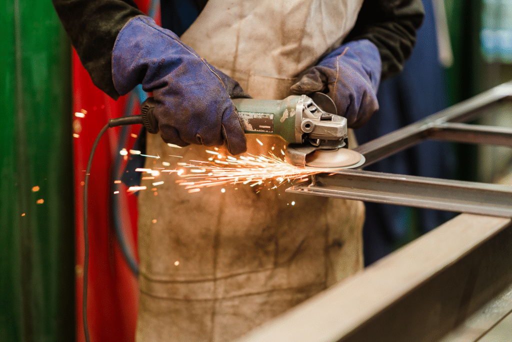 Candid shot of hands at work with steel tools, captured for Crittall’s new website.