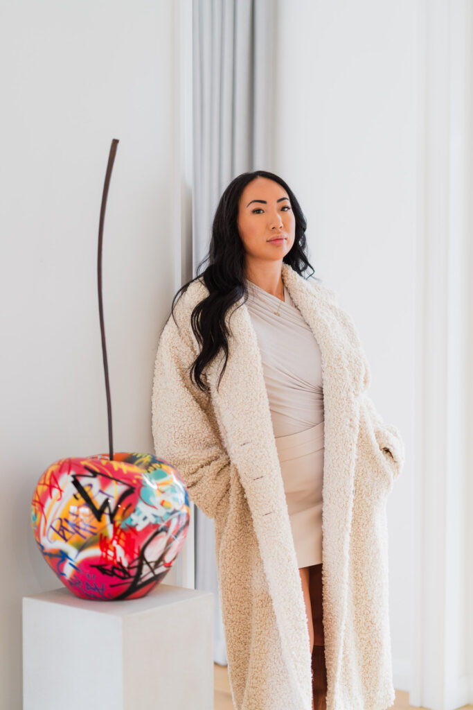 Natural light business portrait of Iyia in a modern Auckland home office for Girls in Business branding.