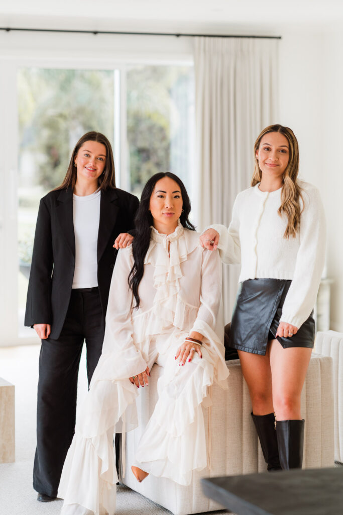Team photo of Make It Happen staff in a bright Coatesville home office, captured by Wonderferris photography.